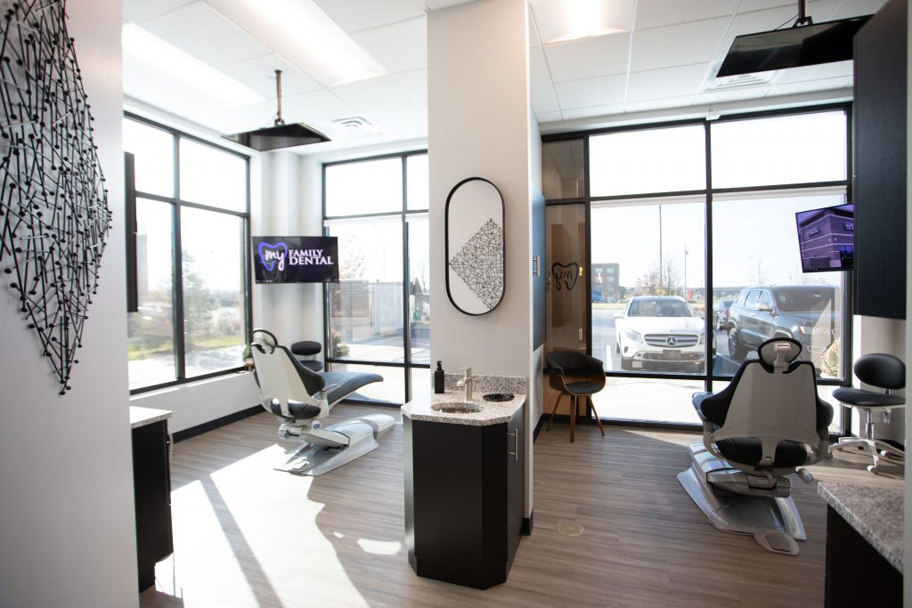 The image shows an interior view of a modern hair salon with sleek furnishings and contemporary decor.
